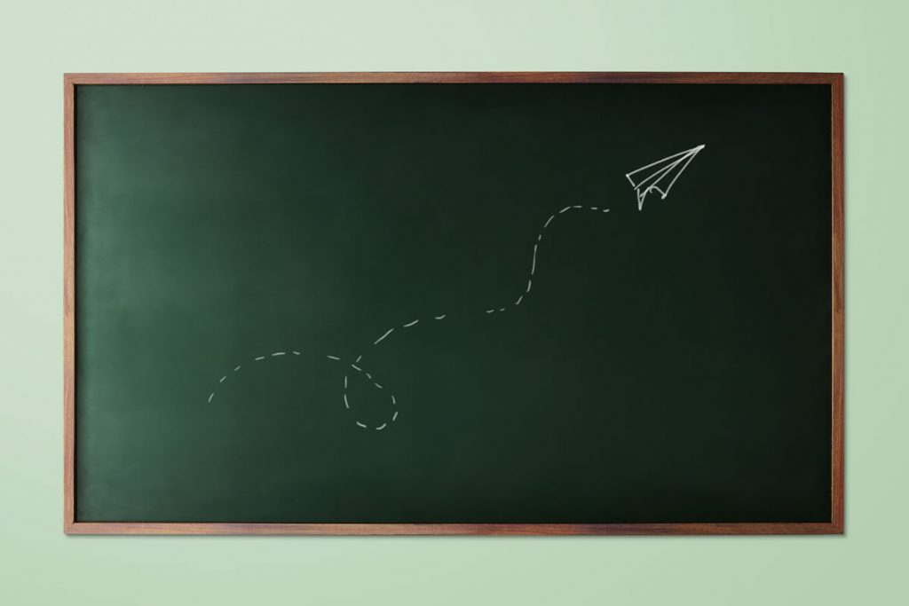 blackboard drawing paper plane